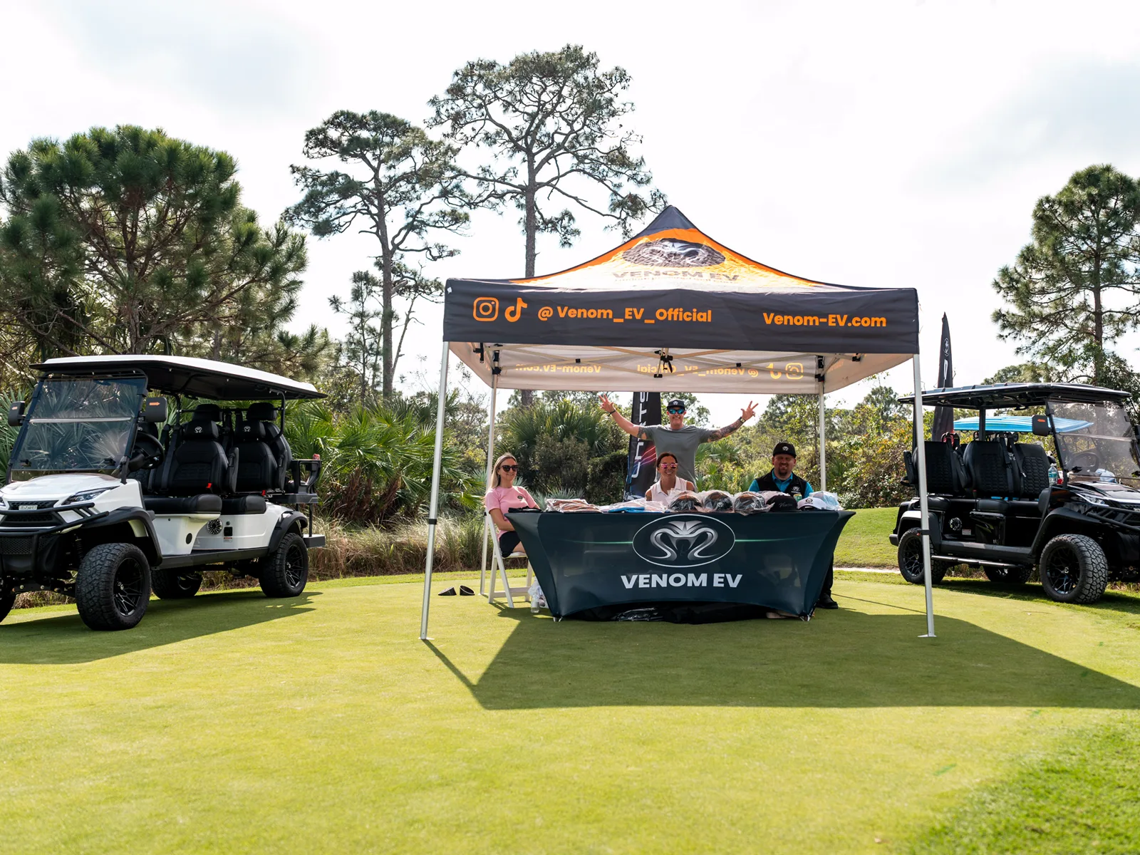 Venom EV dealer display with official golf carts